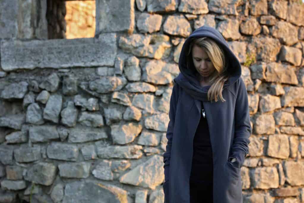 Woman struggling with opioid addiction before seeking detox treatment